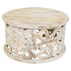 Table basse ronde en bois de manguier avec motifs floraux sculptés
