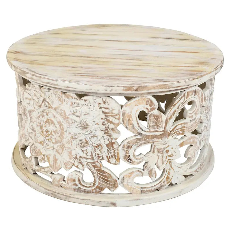Table basse ronde en bois de manguier avec motifs floraux sculptés