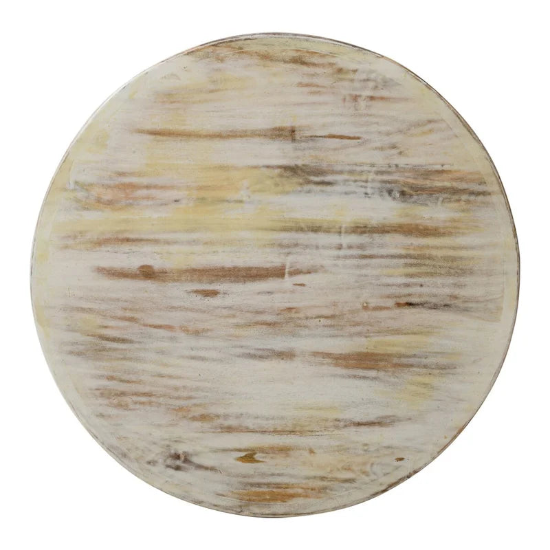 Table basse ronde en bois de manguier avec motifs floraux sculptés