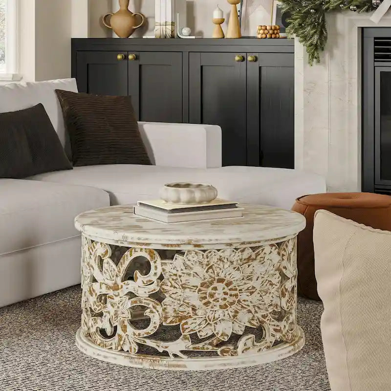 Table basse ronde en bois de manguier avec motifs floraux sculptés